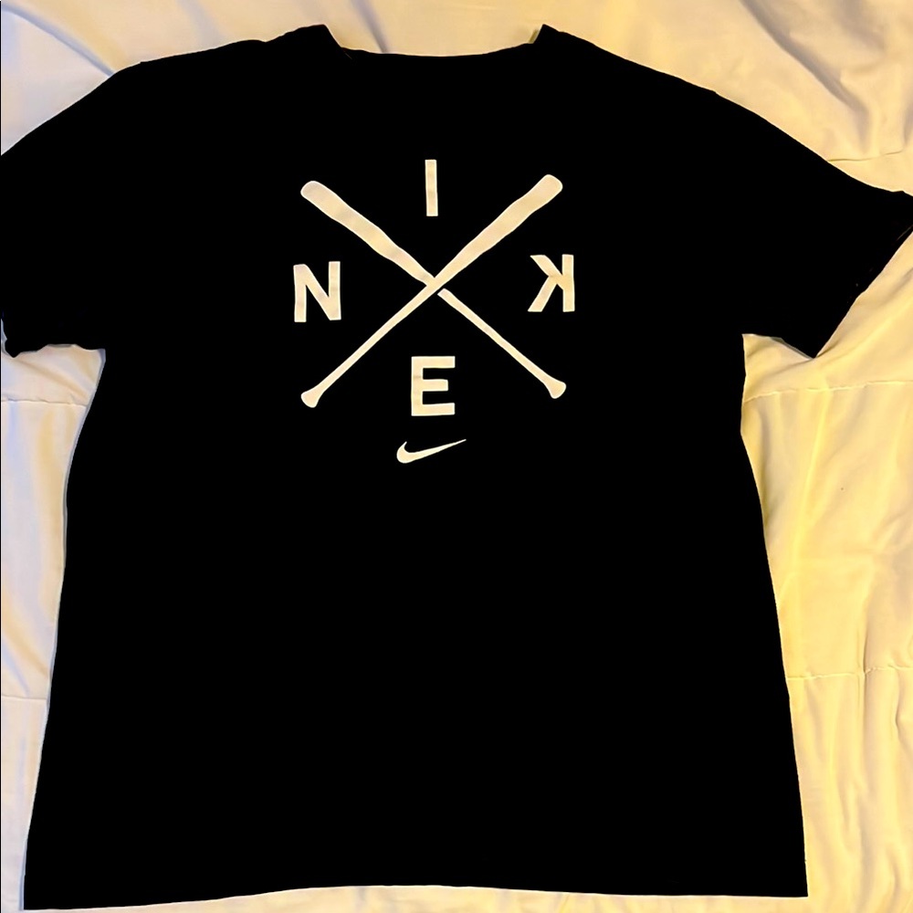 Nike Black T-shirt with baseball design graphic.